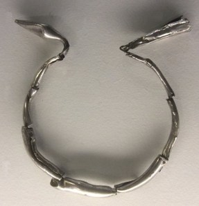 Torques de plata del tesorillo del Cerro del Peñón, expuesto en el Museo de Córdoba